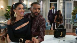 ‘Beyond The Gates’ Must Watch Moments: Bill & Hayley Are Interrupted While Celebrating Their One-Year Wedding Anniversary Beyond the Gates, Karla Mosley, Sean Freeman, Timon Kyle Durrett, Marquita Goings
